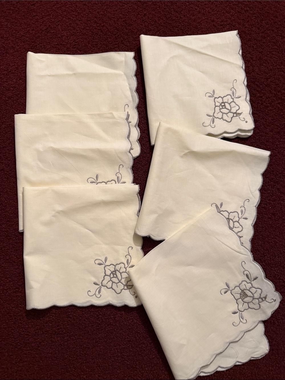 Embroidered Cream Scalloped Napkins with Gray Floral Detail